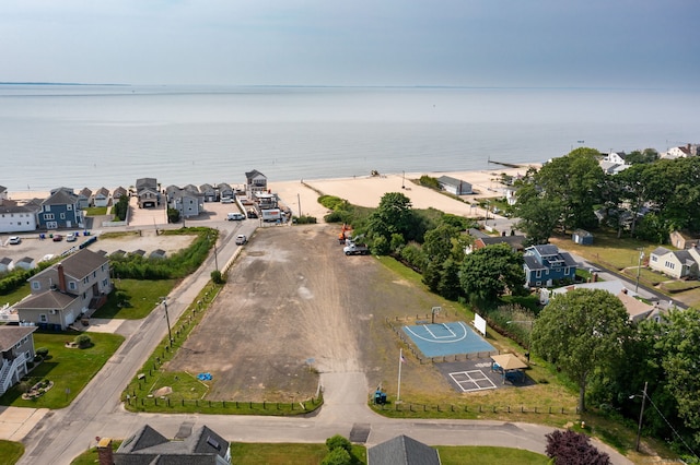 view of property location with nearby suburban area and a nearby body of water