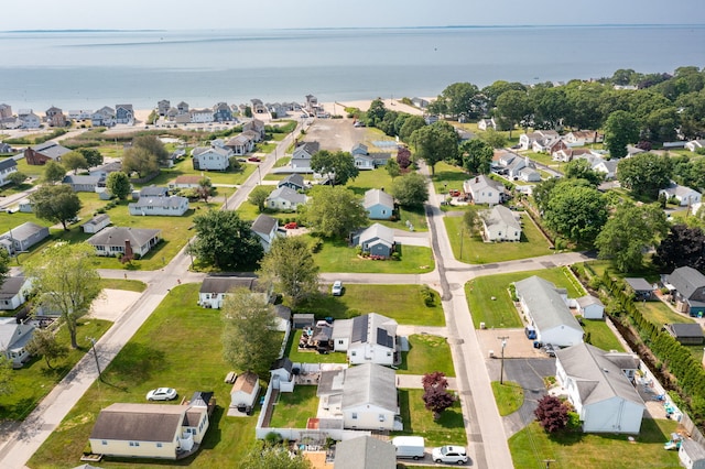 aerial perspective of suburban area featuring a large body of water
