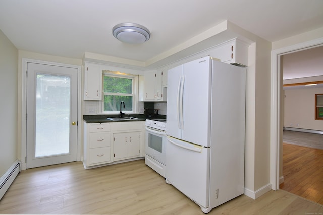118 Putnam Rd, Pomfret, CT 06259 - kitchen featuring white appliances, a sink, a baseboard radiator, light wood-style floors, and dark countertops