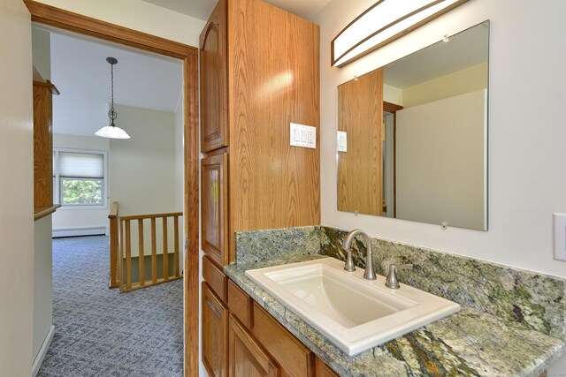 118 Putnam Rd, Pomfret, CT 06259 - bathroom with baseboard heating and vanity
