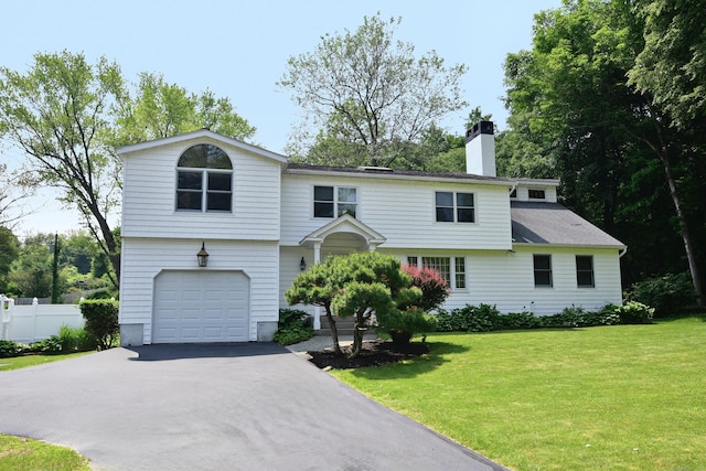 118 Putnam Rd, Pomfret, CT 06259 - view of front of property with an attached garage, a chimney, and driveway