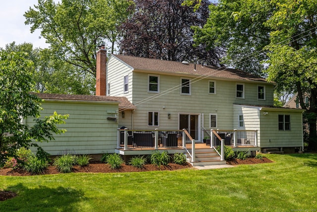 100 Grandview St, Manchester, CT 06040 - back of house with a chimney, a wooden deck, and a lawn