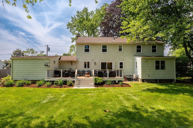 100 Grandview St, Manchester, CT 06040 - back of house featuring a deck, a chimney, a yard, and roof with shingles
