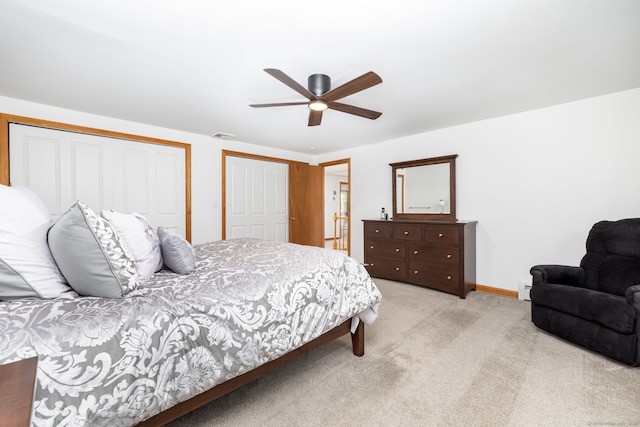 100 Grandview St, Manchester, CT 06040 - bedroom with multiple closets, light carpet, baseboards, baseboard heating, and ceiling fan