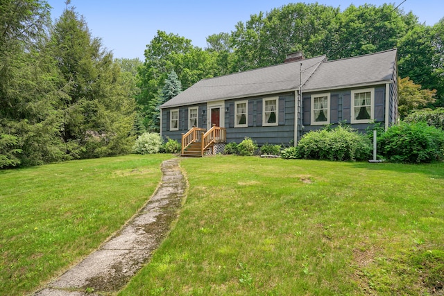 2 Stowe Pl, Trumbull, CT 06611 - view of front of home featuring a chimney, a front yard, and roof with shingles