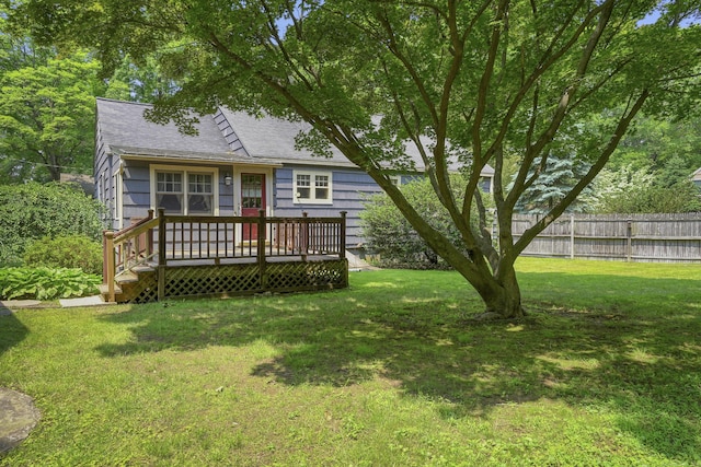 2 Stowe Pl, Trumbull, CT 06611 - back of house with a shingled roof and a deck