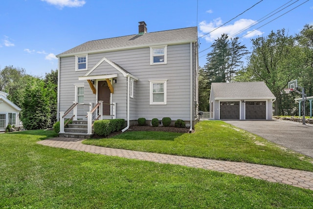 185 Lovers Ln, Fairfield, CT 06824 - view of front of property featuring an outdoor structure, a garage, a chimney, and a front yard