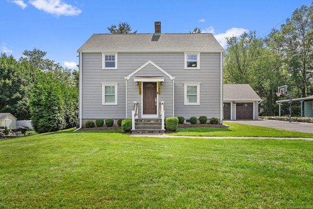 185 Lovers Ln, Fairfield, CT 06824 - view of front of house with a front yard and a chimney