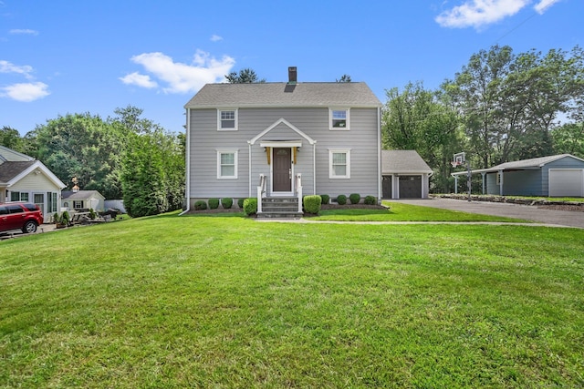 185 Lovers Ln, Fairfield, CT 06824 - colonial-style house featuring a front yard and a chimney