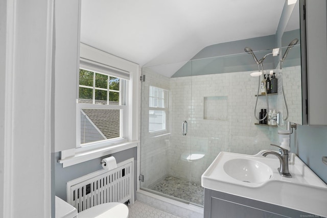 185 Lovers Ln, Fairfield, CT 06824 - full bathroom featuring radiator heating unit, a stall shower, lofted ceiling, vanity, and tile patterned flooring