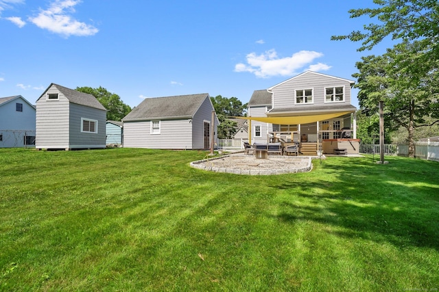 185 Lovers Ln, Fairfield, CT 06824 - back of house with a patio and an outbuilding