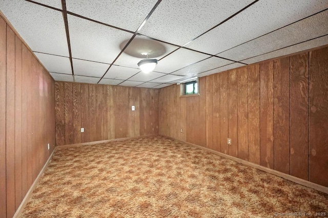 26 Paula Rd, East Haddam, CT 06423 - basement featuring a drop ceiling, wood walls, and carpet
