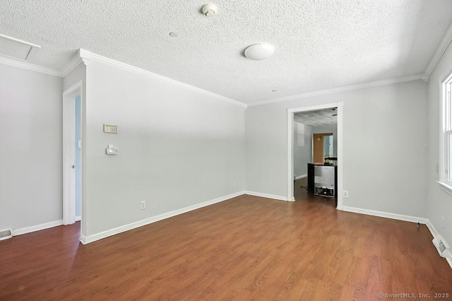 26 Paula Rd, East Haddam, CT 06423 - empty room with a smoke detector, a textured ceiling, wood finished floors, and crown molding