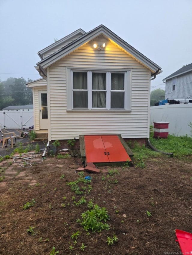 6 Cedar St, Enfield, CT 06082 - rear view of property with a gate