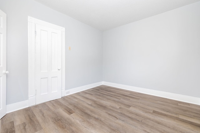 57 Wilson St, New Britain, CT 06051 - unfurnished room featuring wood finished floors and baseboards