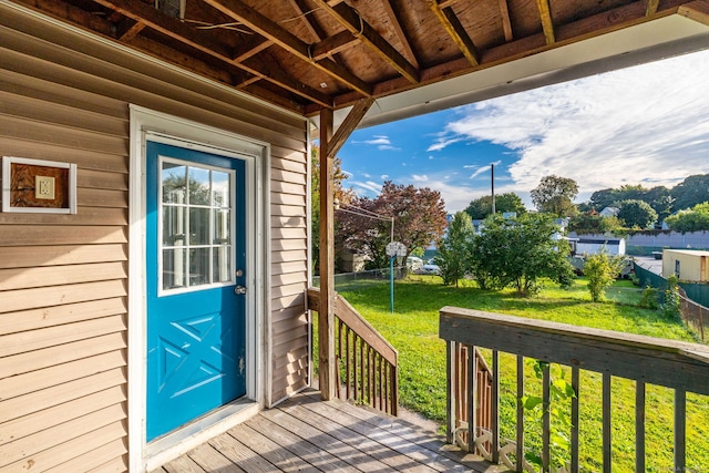 57 Wilson St, New Britain, CT 06051 - doorway to property featuring a yard and a wooden deck