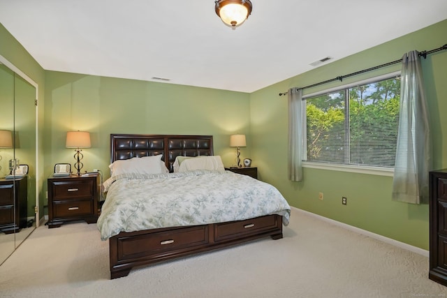 2437 Bedford St Unit E5, Stamford, CT 06905 - bedroom featuring light colored carpet and baseboards