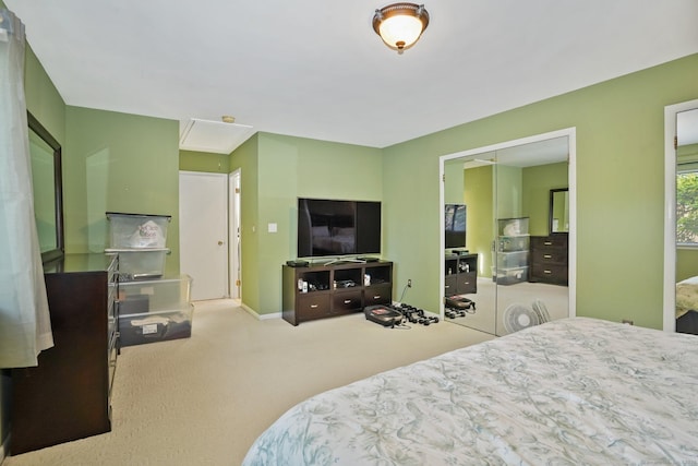 2437 Bedford St Unit E5, Stamford, CT 06905 - carpeted bedroom with baseboards, attic access, and a closet