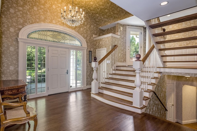 15 NE Rd, Farmington, CT 06032 - foyer with wallpapered walls, plenty of natural light, wood finished floors, and stairway