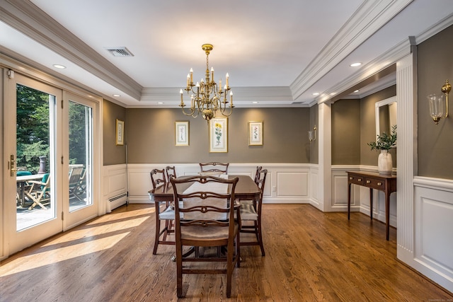 15 NE Rd, Farmington, CT 06032 - dining room with a raised ceiling, a baseboard heating unit, a chandelier, wood finished floors, and crown molding