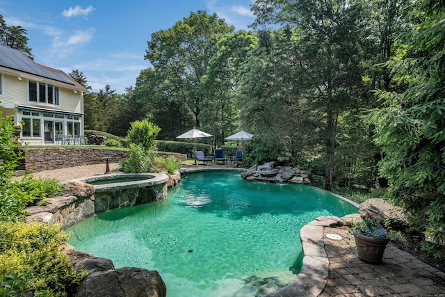 15 NE Rd, Farmington, CT 06032 - view of pool featuring a patio area and a pool with connected hot tub