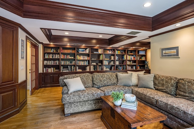 15 NE Rd, Farmington, CT 06032 - living room with crown molding, built in features, wood finished floors, and recessed lighting