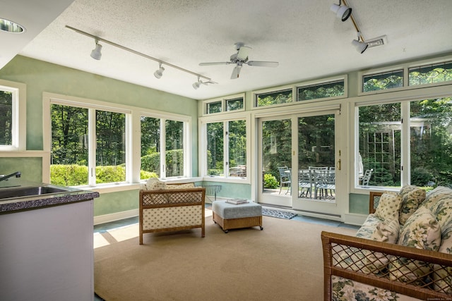 15 NE Rd, Farmington, CT 06032 - sunroom / solarium featuring track lighting, a textured ceiling, and carpet floors
