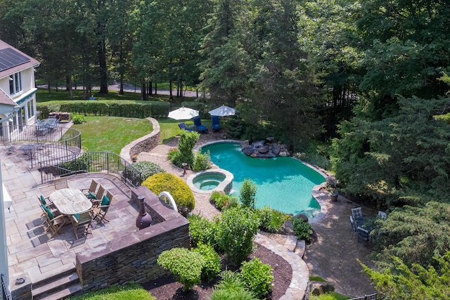 15 NE Rd, Farmington, CT 06032 - view of pool with a patio, a pool with connected hot tub, and outdoor dining space