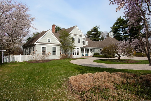 3 Ridgebury Rd, Simsbury, CT 06001 - rear view of property with a chimney and curved driveway
