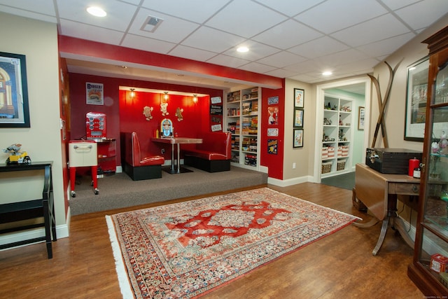 3 Ridgebury Rd, Simsbury, CT 06001 - home office featuring built in features, baseboards, wood finished floors, recessed lighting, and a paneled ceiling
