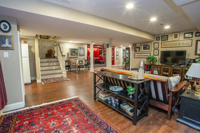 3 Ridgebury Rd, Simsbury, CT 06001 - living room with stairs, wood finished floors, baseboards, and ornate columns