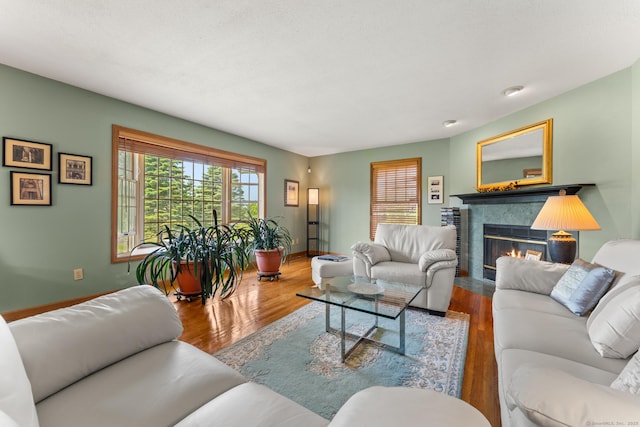 101 Overton Farm Dr, Southbury, CT 06488 - living room featuring a fireplace and wood finished floors