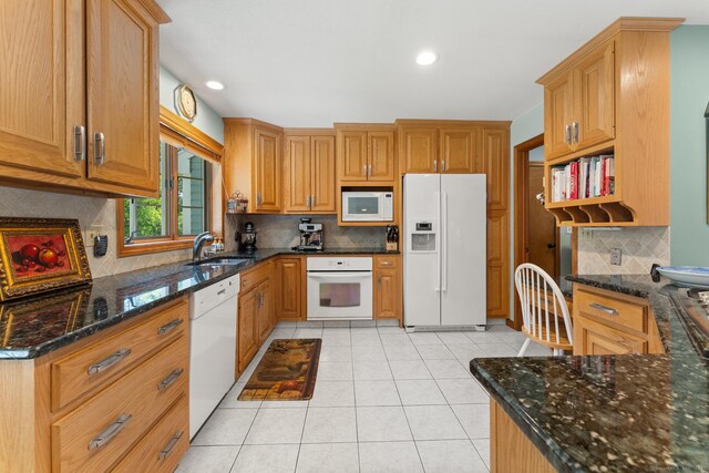 101 Overton Farm Dr, Southbury, CT 06488 - kitchen with white appliances, decorative backsplash, open shelves, light tile patterned flooring, and dark stone countertops