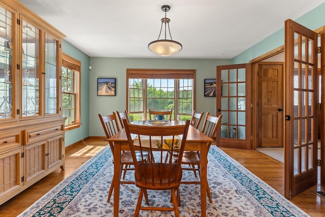 101 Overton Farm Dr, Southbury, CT 06488 - dining space with healthy amount of natural light, wood finished floors, and french doors