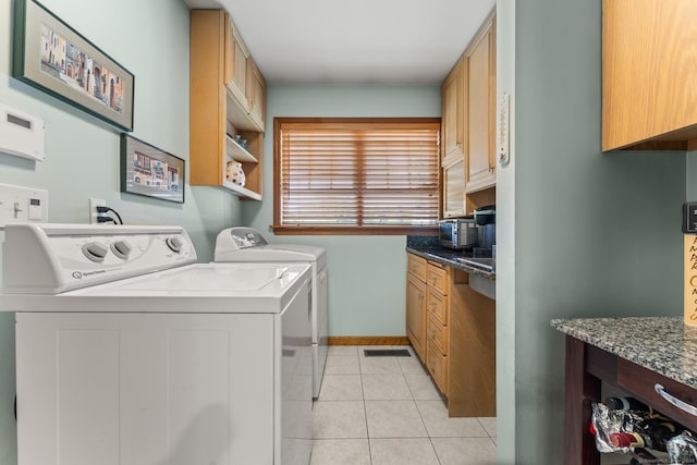 101 Overton Farm Dr, Southbury, CT 06488 - laundry area featuring washing machine and clothes dryer and light tile patterned floors