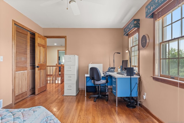 101 Overton Farm Dr, Southbury, CT 06488 - bedroom featuring wood finished floors and multiple windows