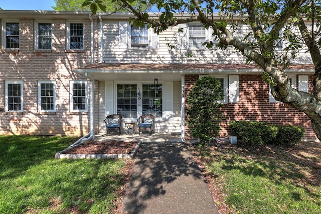 39 Jackson Dr Unit 39, Milford, CT 06460 - view of front of home featuring a front lawn and brick siding