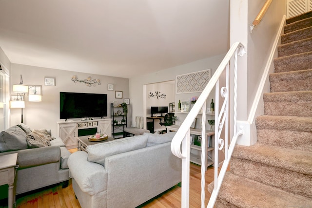 39 Jackson Dr Unit 39, Milford, CT 06460 - living area featuring stairs and light wood-style flooring