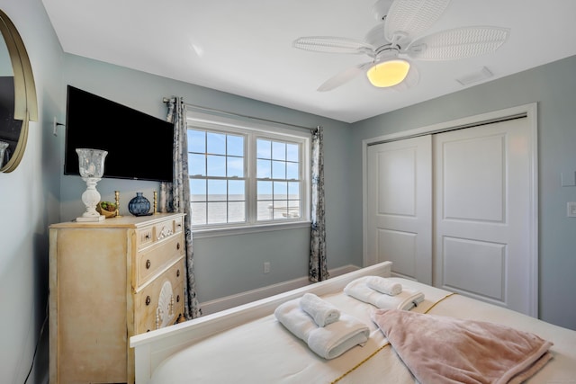 74 Morgan Ave, East Haven, CT 06512 - bedroom with a closet, a ceiling fan, and baseboards