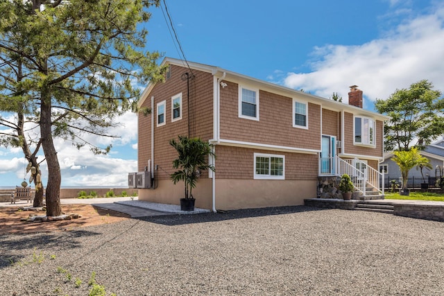 74 Morgan Ave, East Haven, CT 06512 - view of front of home featuring a chimney