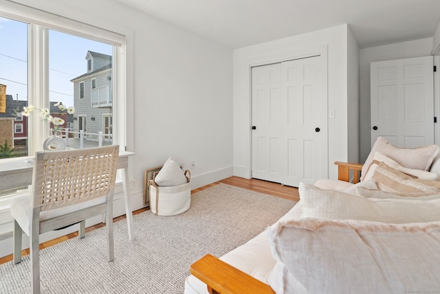 685 Fairfield Beach Rd Unit 685, Fairfield, CT 06824 - bedroom featuring wood finished floors, baseboards, and a closet