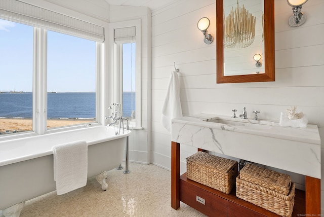 685 Fairfield Beach Rd Unit 685, Fairfield, CT 06824 - full bath featuring a freestanding tub, a water view, vanity, and wooden walls