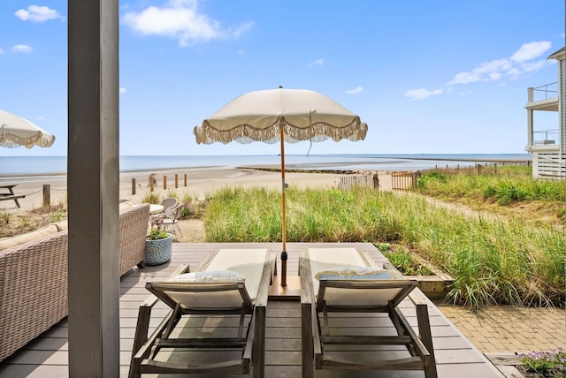 685 Fairfield Beach Rd Unit 685, Fairfield, CT 06824 - deck featuring view of water and beach and a patio