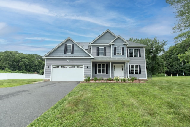 1705 Orchard Rd, Berlin, CT 06037 - view of front of home with driveway, covered porch, and a garage
