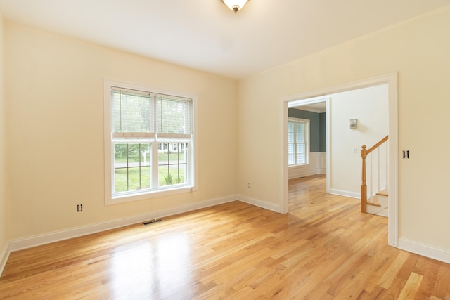 1705 Orchard Rd, Berlin, CT 06037 - spare room with plenty of natural light, light wood finished floors, and stairway