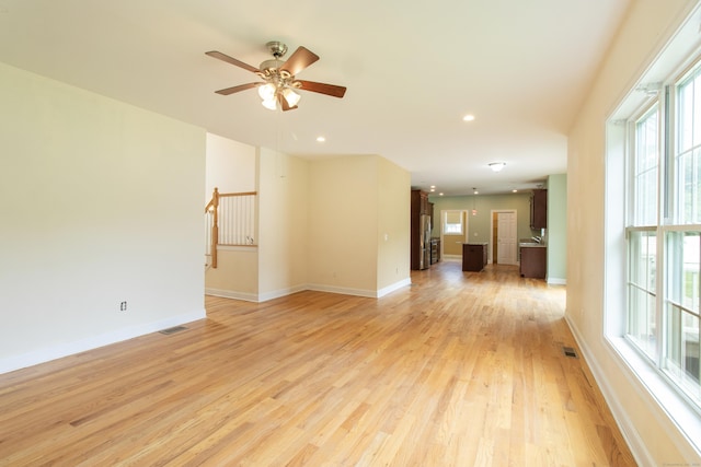 1705 Orchard Rd, Berlin, CT 06037 - unfurnished room featuring plenty of natural light, light wood-style floors, ceiling fan, and recessed lighting