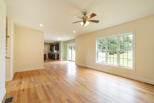 1705 Orchard Rd, Berlin, CT 06037 - unfurnished living room featuring ceiling fan, light wood-style flooring, and recessed lighting