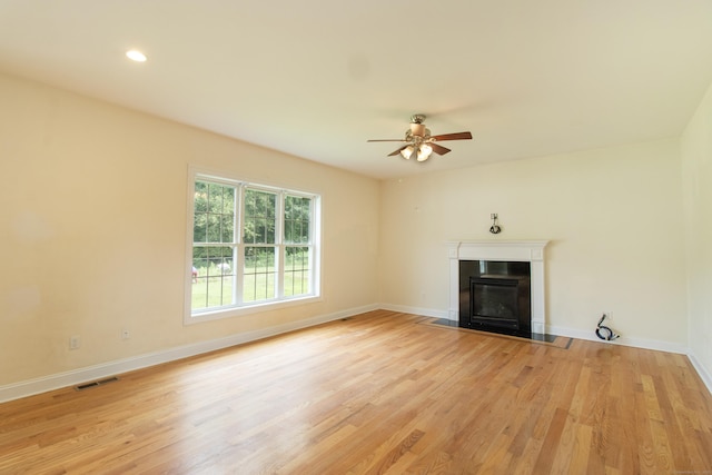 1705 Orchard Rd, Berlin, CT 06037 - unfurnished living room featuring light wood-style flooring, a ceiling fan, a fireplace with flush hearth, and recessed lighting