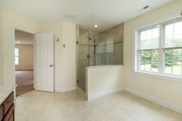 1705 Orchard Rd, Berlin, CT 06037 - bathroom with vanity, healthy amount of natural light, a stall shower, tile patterned floors, and recessed lighting