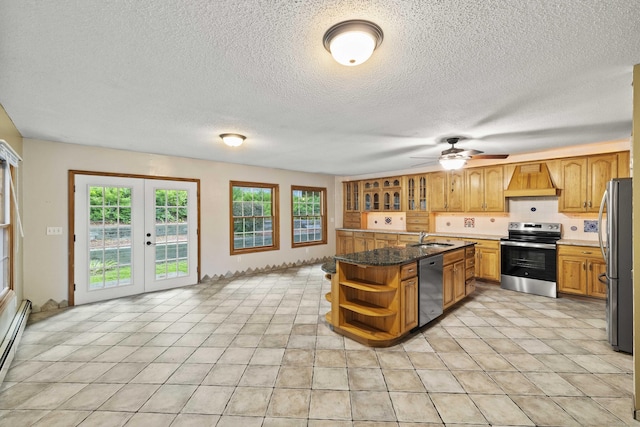 9 Philip Ln, Ledyard, CT 06339 - kitchen featuring appliances with stainless steel finishes, open shelves, custom exhaust hood, ceiling fan, and french doors